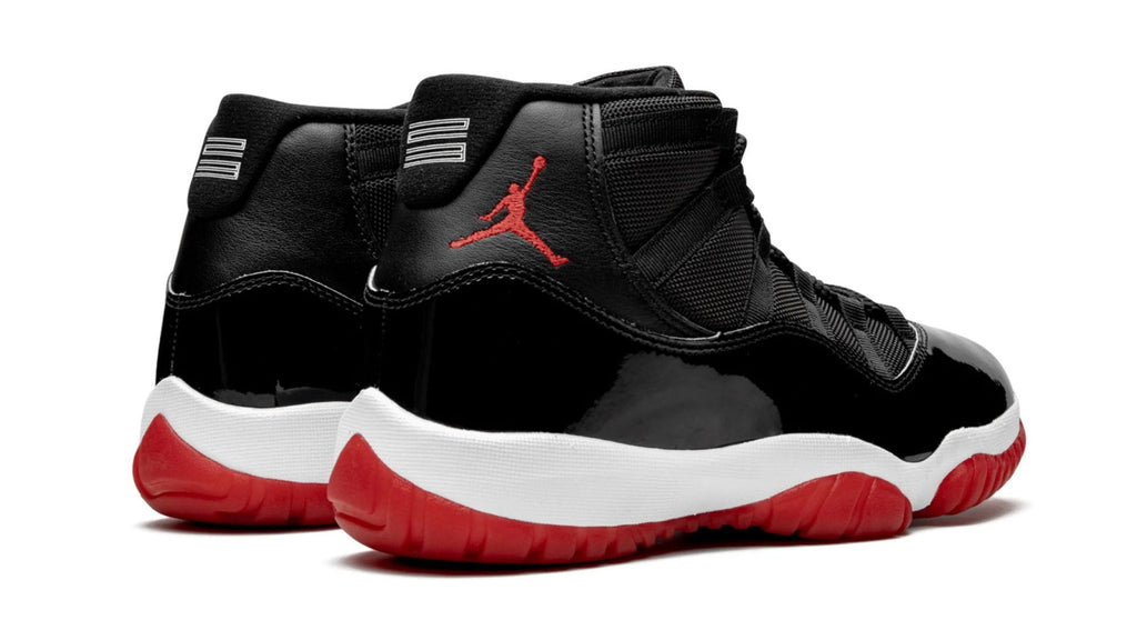 Air Jordan 11 Retro Bred 2019 - Iconic Black & Red Patent Leather Sneaker