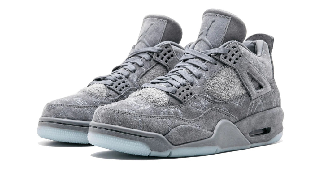 Air Jordan 4 Retro x KAWS - Premium Grey Suede Collaborative Sneaker