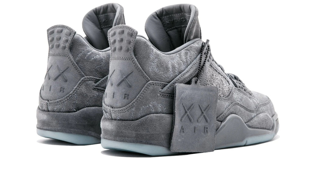 Air Jordan 4 Retro x KAWS - Premium Grey Suede Collaborative Sneaker
